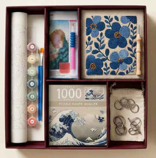 Open kit tray with paint by numbers, diamond painting, punch needle and puzzle