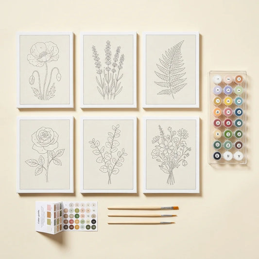 Everything in each set - 6 canvases, 24 paints, 3 brushes, guide